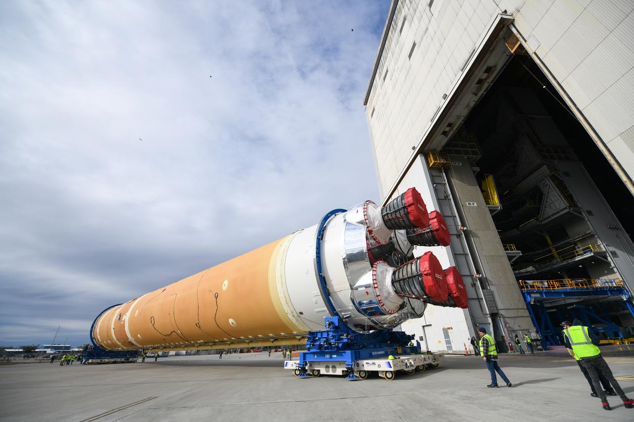 These images show how teams at NASA’s Michoud Assembly Facility in New Orleans moved the core stage, complete with all four RS-25 engines, for NASA’s Space Launch System (SLS) rocket to Building 110 for final shipping preparations on Jan. 1. The SLS core stage includes state-of-the-art avionics, propulsion systems and two colossal propellant tanks that collectively hold 733,000 gallons of liquid oxygen and liquid hydrogen to power its four RS-25 engines. The completed stage, which will provide more than 2 million pounds of thrust to help power the first Artemis mission to the Moon, will be shipped via the agency’s Pegasus barge from Michoud to NASA’s Stennis Space Center near Bay St. Louis, Mississippi, later this month. Once at Stennis, the Artemis rocket stage will be loaded into the B-2 Test Stand for the core stage Green Run test series. The comprehensive test campaign will progressively bring the entire core stage, including its avionics and engines, to life for the first time to verify the stage is fit for flight ahead of the launch of Artemis I.